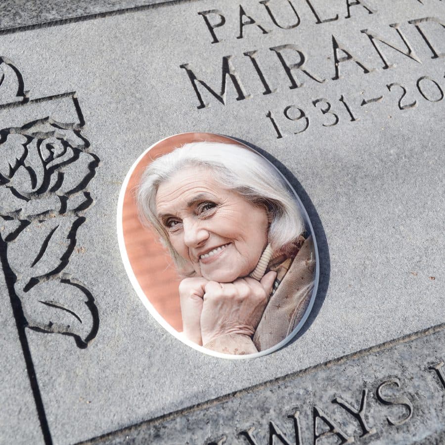 Ceramic portrait mounted on a headstone